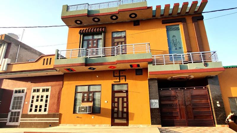 Madrasi Dana marble texture paint on a double-storey house